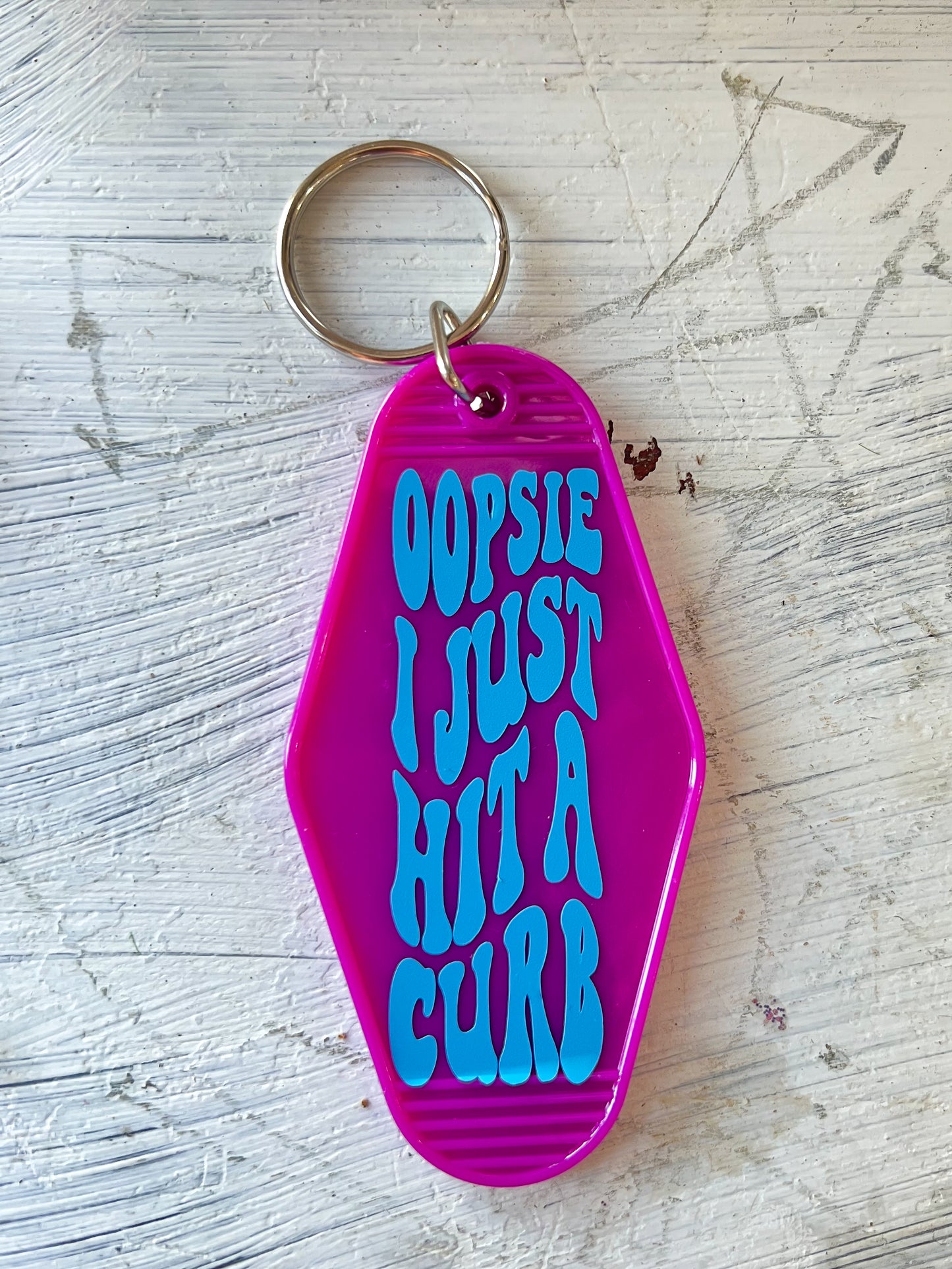 "Oopsie I Just Hit A Curb" Hotel Keychain