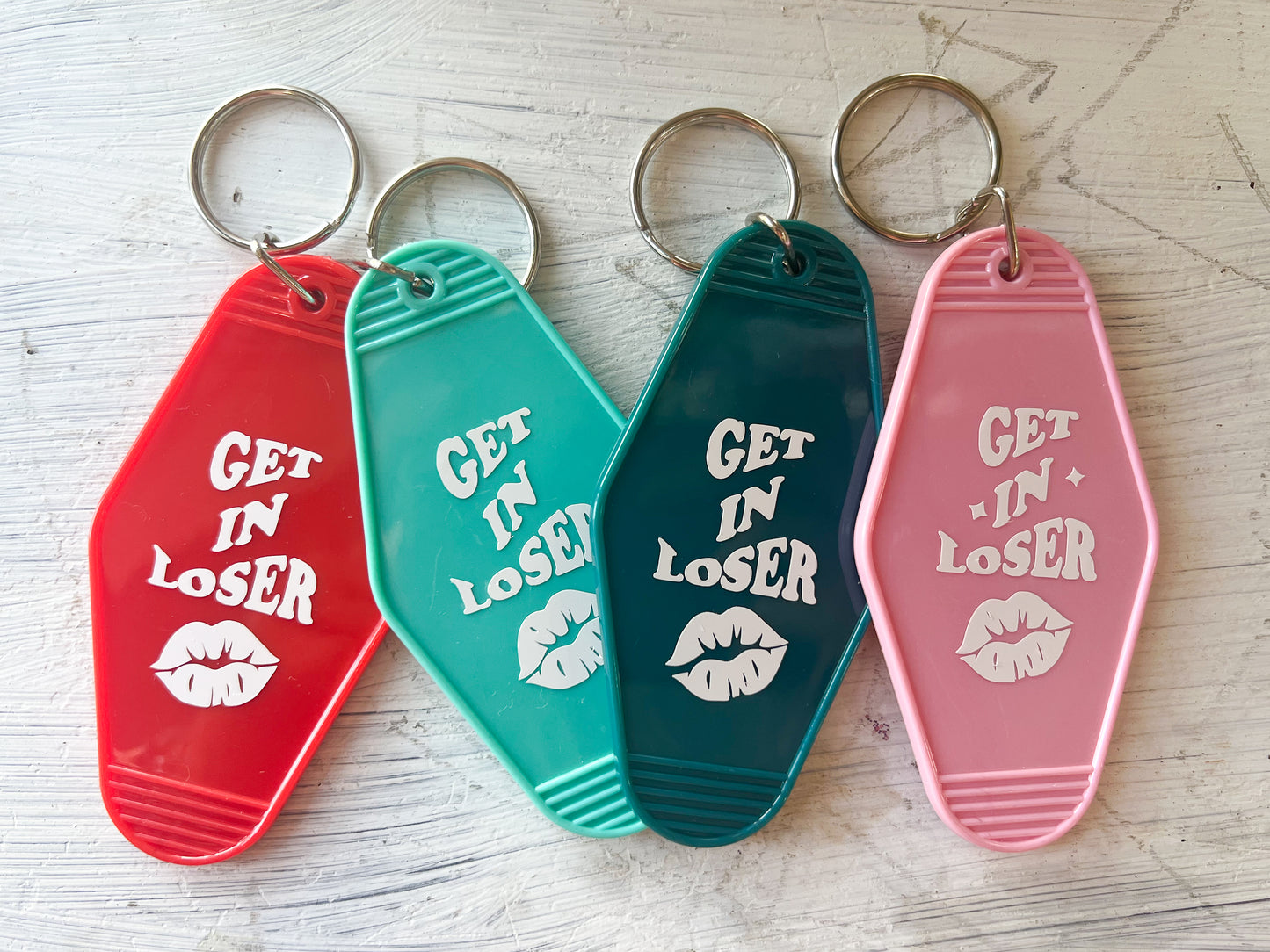"Get In Loser" Hotel Keychain